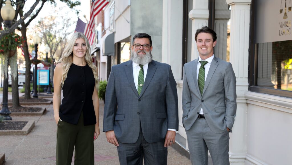 The team of Vindex Law, PC outside the firm's office in downtown Jefferson City, Missouri